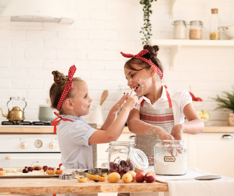 the girls in the kitchen, cooking together the girls in the kitchen, cooking together